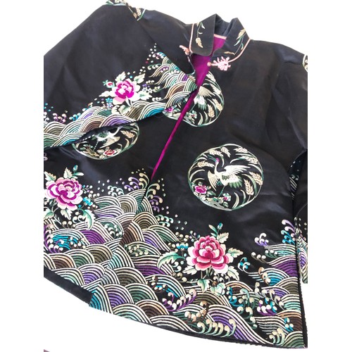 215 - Four traditional Chinese silk jackets.