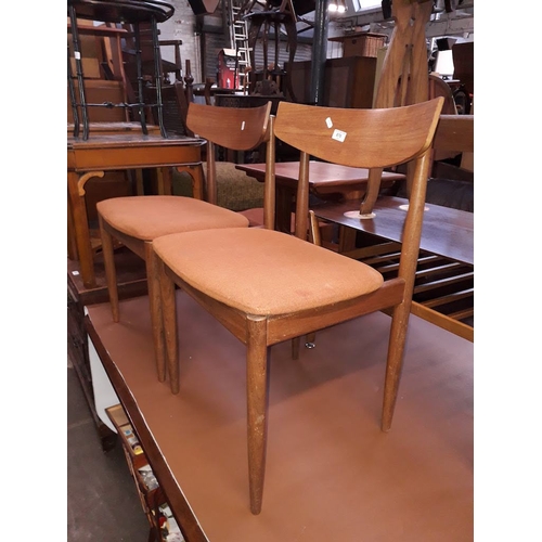 876 - A pair of teak G-Plan dining chairs