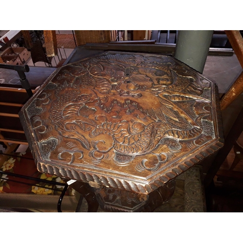 890 - Three carved wooden side tables, one with carved dragon top.