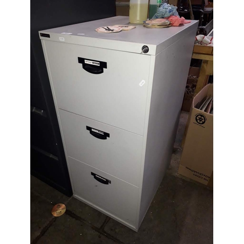 905 - A Triumph metal three drawer filing cabinet