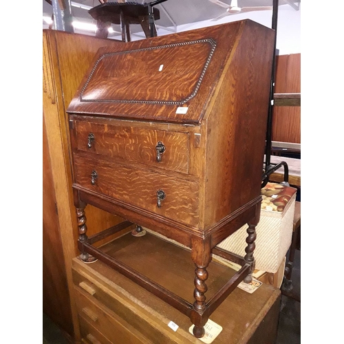 907 - An oak bureau