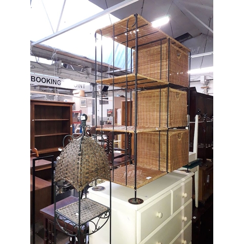 909 - Two metal framed and wicker shelving/storage units