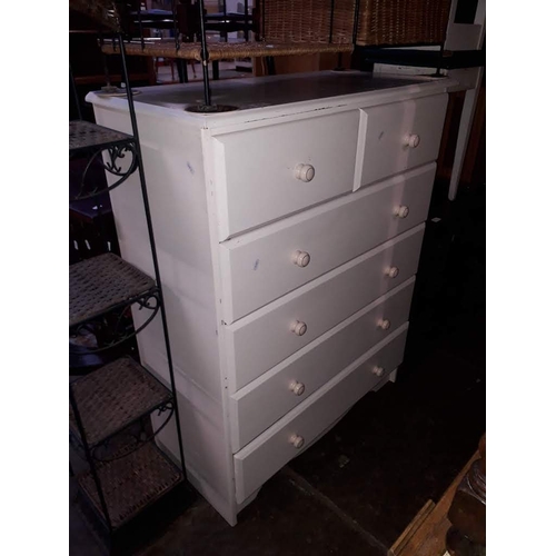 910 - A painted pine chest of drawers.