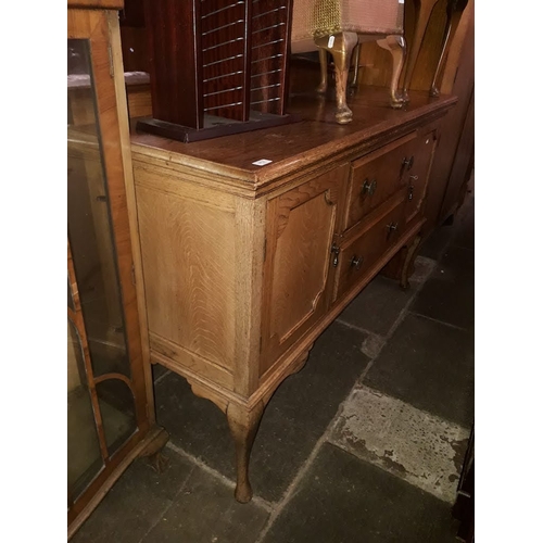 912 - An oak sideboard, length 153cm.