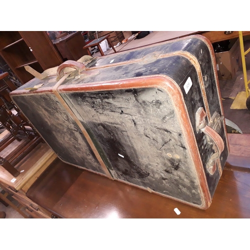 929 - A vintage suitcase including two hangers marked 'WILT TRUNK CO. EST 1862 CHICAGO'