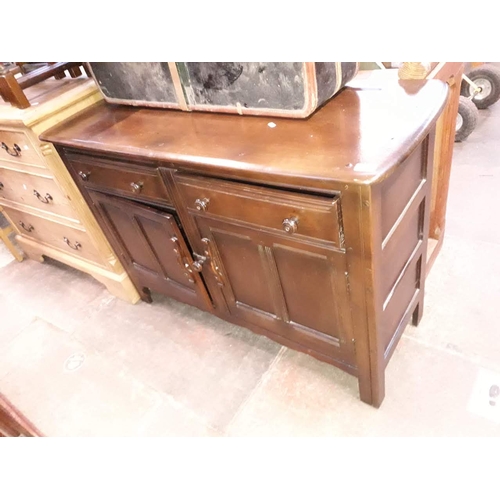 930 - An elm ercol sideboard