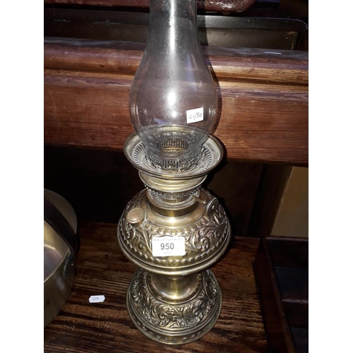 950 - A brass oil lamp with funnel, labled 'MANUFACTURED IN GERMANY FOR S P CATERSON LONDON SE'