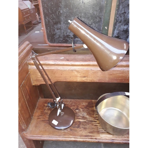 952 - An Anglepoise lighting Ltd. brown Anglepoise lamp.