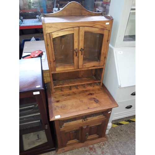 957 - A rustic indian glazed two part cabinet