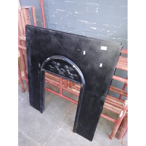 961 - Two cast iron fire surrounds