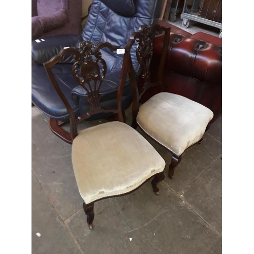 970 - A pair of nursing chairs