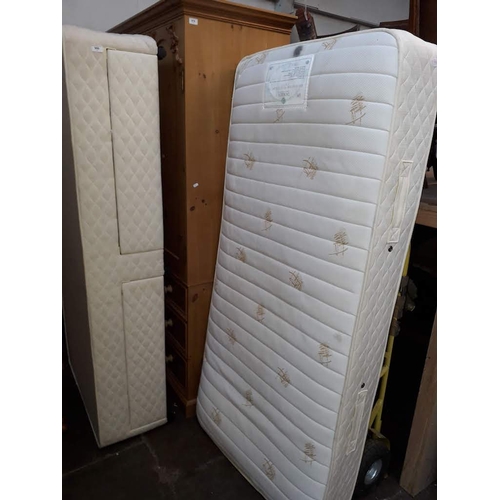 980 - A single bed and mattress