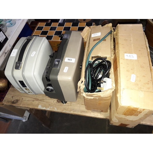 983 - Four assorted vintage projectors.