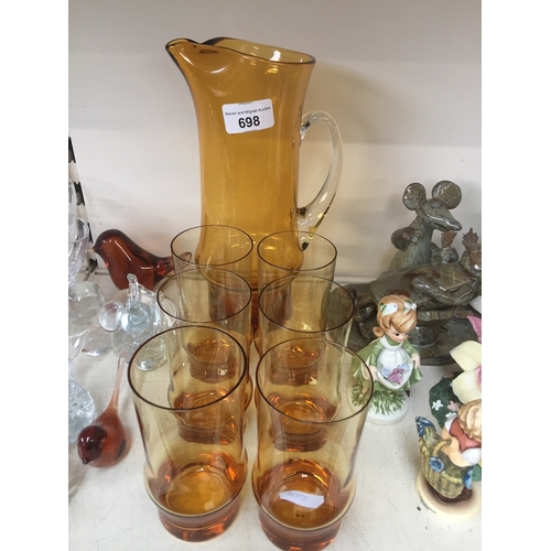 698 - Whitefriars style amber glass waterjug set