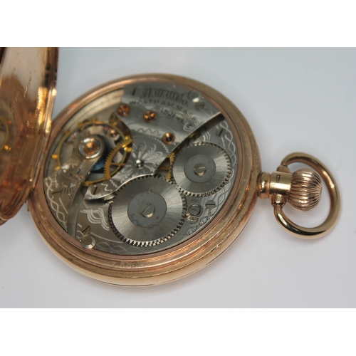 102 - A hallmarked 9ct gold Waltham half hunter pocket watch, circa 1919 with white enamel dial, Roman num... 