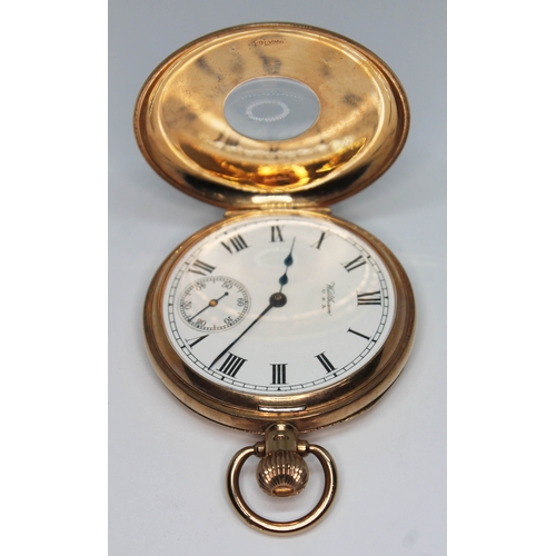 102 - A hallmarked 9ct gold Waltham half hunter pocket watch, circa 1919 with white enamel dial, Roman num... 