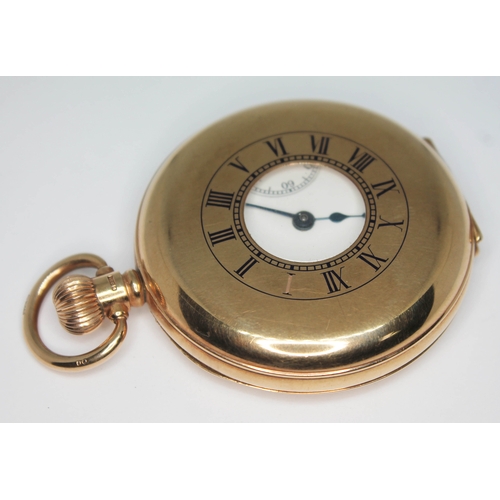 102 - A hallmarked 9ct gold Waltham half hunter pocket watch, circa 1919 with white enamel dial, Roman num... 