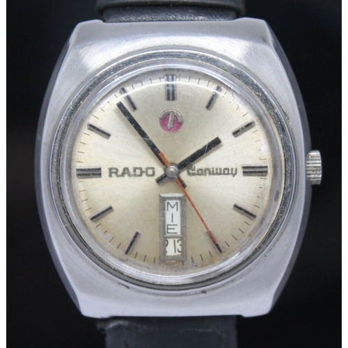 109 - A vintage stainless steel Rado Conway automatic wristwatch with signed champagne dial, red center sw... 