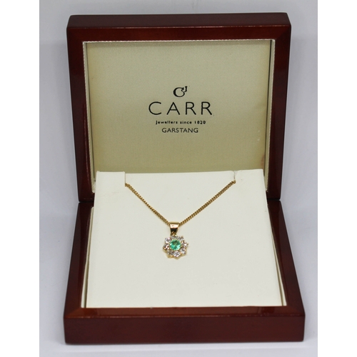 110 - A diamond and emerald cluster pendant, the central bezel set old European cut emerald weighing appro... 