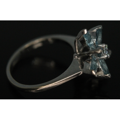 113 - A diamond and aquamarine cocktail ring, the central modern round brilliant cut stone weight approx. ... 