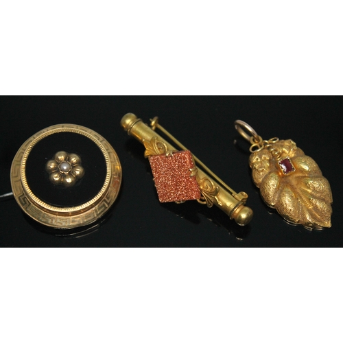 122 - Three items of yellow metal jewellery comprising a jet pendant with central split pearl and Greek ke... 