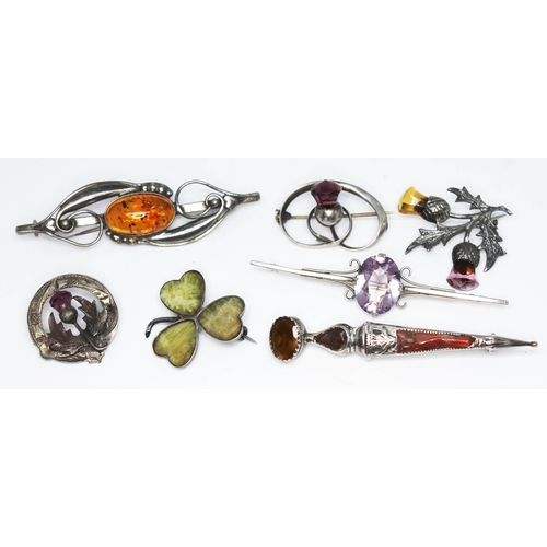 126 - Assorted brooches comprising hallmarked silver, Scottish, Charles Horner, Sterling, various settings... 