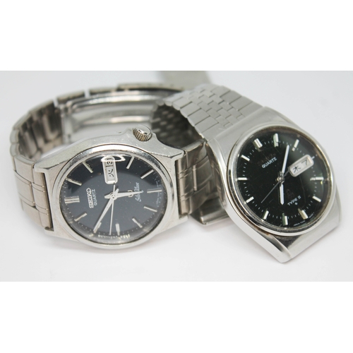 243 - Two vintage 1970s stainless steel Seiko quartz JDM Kanji wristwatches comprising a SilverWave 7546-8... 