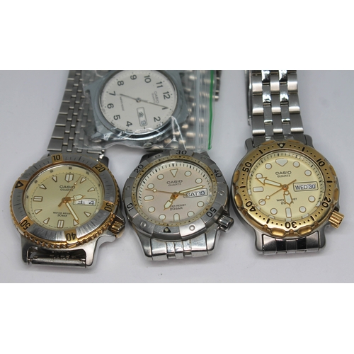 248 - Four Casio JDM Kanji wristwatches comprising three stainless steel mid sized divers style quartz day... 