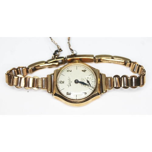 250 - A hallmarked 9ct gold ladies Everite wristwatch with strap marked '9ct', gross wt. 14.57g.