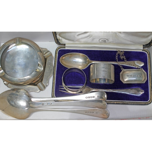 252 - Assorted hallmarked silver comprising three George III desert spoons, two ash trays, a cased Christe... 