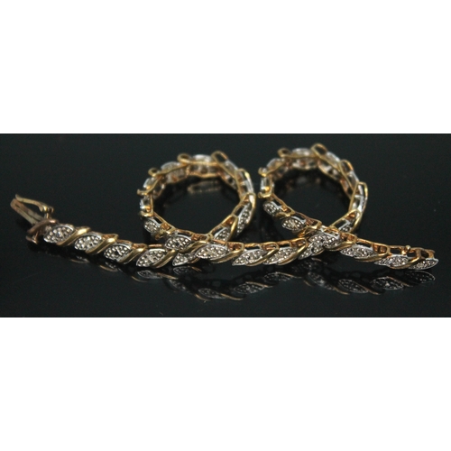 290 - A hallmarked 9ct gold bracelet set with diamond chips, length 18cm, gross wt. 6.57g.
