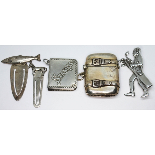 299 - Assorted novelty items comprising two book marks with fish and horse finials, a stamp case, a vesta ... 