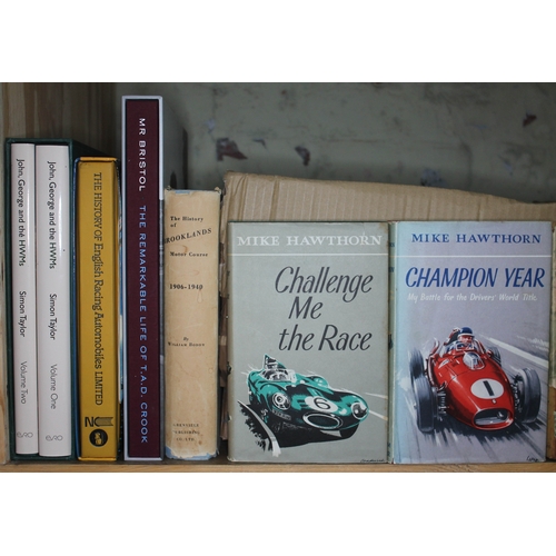 318 - A large collection of motor racing books, various titles, mainly mid to late 20th century.