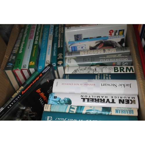 318 - A large collection of motor racing books, various titles, mainly mid to late 20th century.