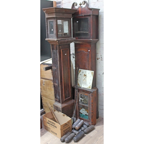 67 - Assorted clock spares comprising two long case clock cases, a painted dial, an American wall clock, ... 