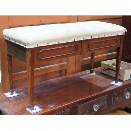 70 - An Edwardian duet piano stool, length 98cm.