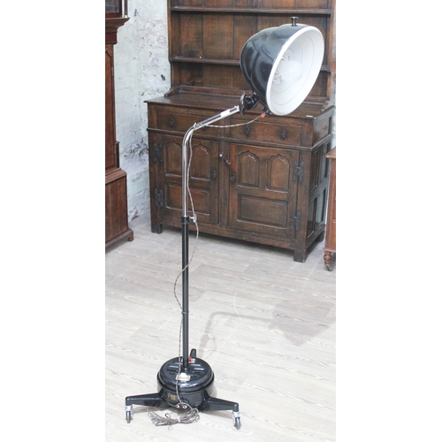 71 - A retro angle lamp on trolley base, 