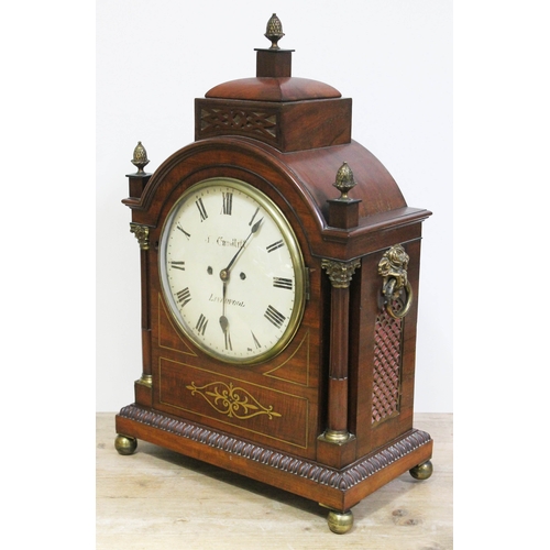 9 - A Regency brass inlaid mahogany bracket clock, domed top with brass finials, corinthian brass mounte... 