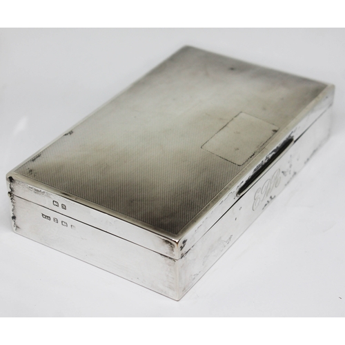 93 - A hallmarked silver cigarette case, length 15cm.