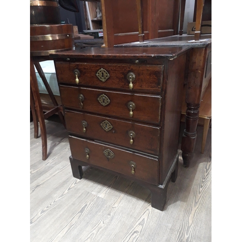 79 - An 18th century provincial oak bachelor's chest, width  58cm, depth 28.5cm & height 74cm. (Missing h... 