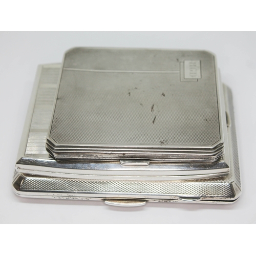 91 - A group of three hallmarked silver cigarette cases, wt.  12 1/4oz.