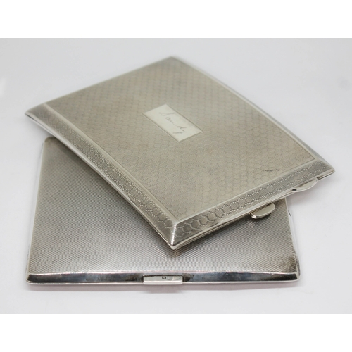 94 - Two hallmarked silver cigarette cases, wt. 11oz.