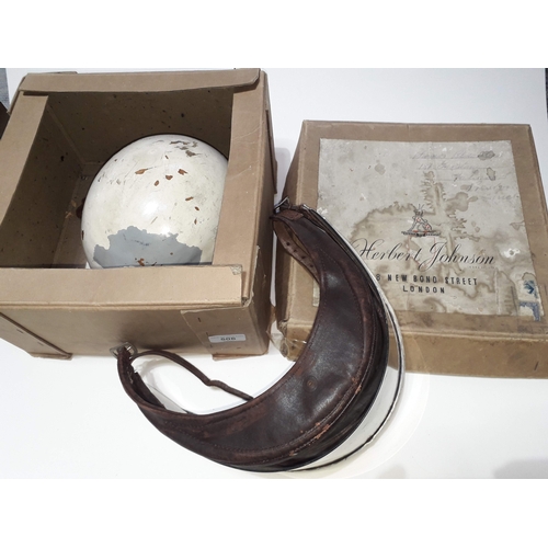 506 - A HERBERT JOHNSON vintage motor racing helmet in box with two visors, a pair of goggles and a pair o... 