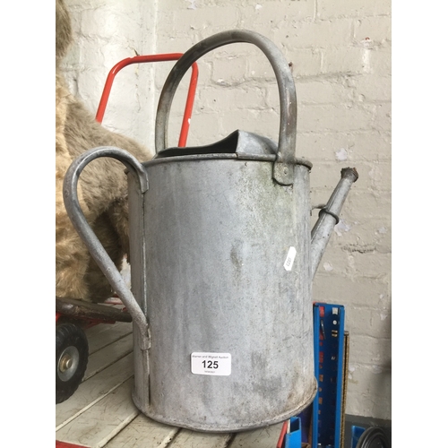 125 - A galvanised watering can.