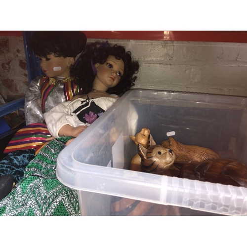 143 - Two large dolls and a crate of wooden cats