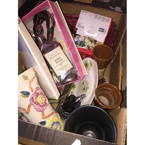 203 - A box of collectables, pottery, ornaments, etc.