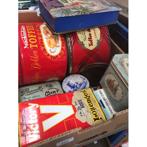 223 - A box of old tins.