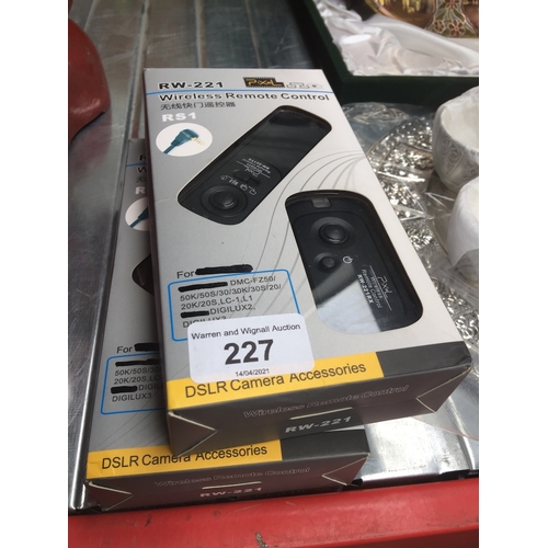 227 - 2 wireless remote controls for Panasonic digital cameras.