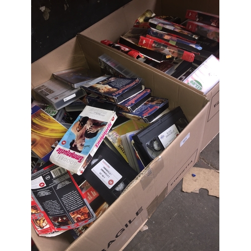 301 - 2 boxes of adult VHS cassettes.