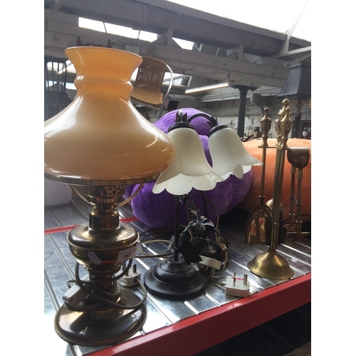 347 - A brass table lamp with glass shade, 2 other lamps and a brass fireside companion set.